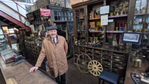 Ian Bean in The1900s Town garage at Beamish Museum